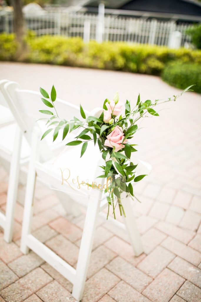 ceremony chair decor at riverside hotel wedding