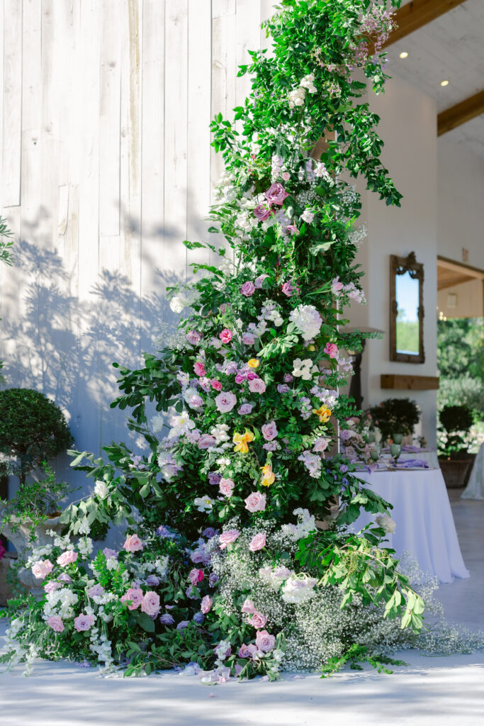 wedding floral arch at white trail club wedding